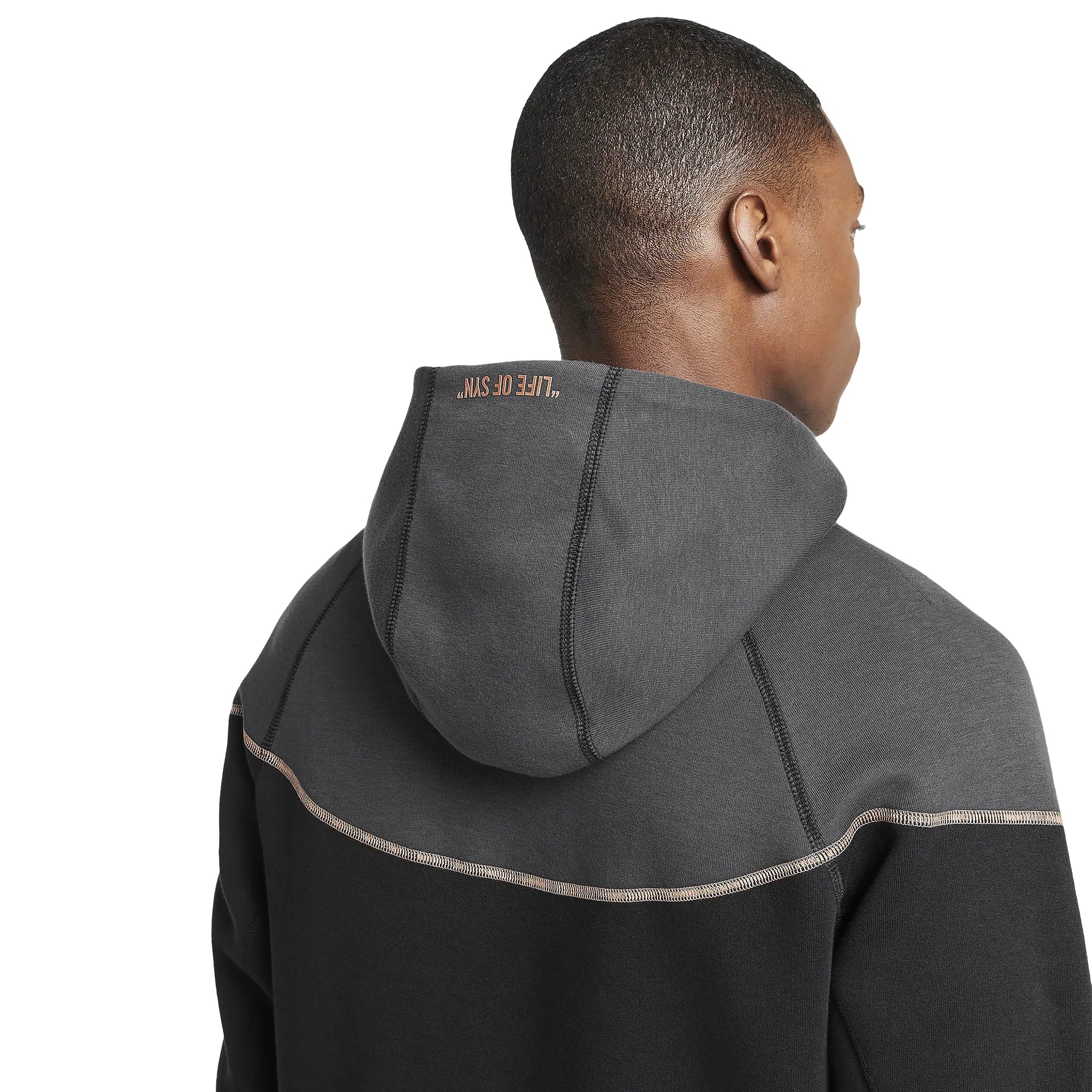 Model hood view of Syna World x Nike Central Cee Tech Fleece Black Tracksuit HQ3748-010 | HQ3749-010